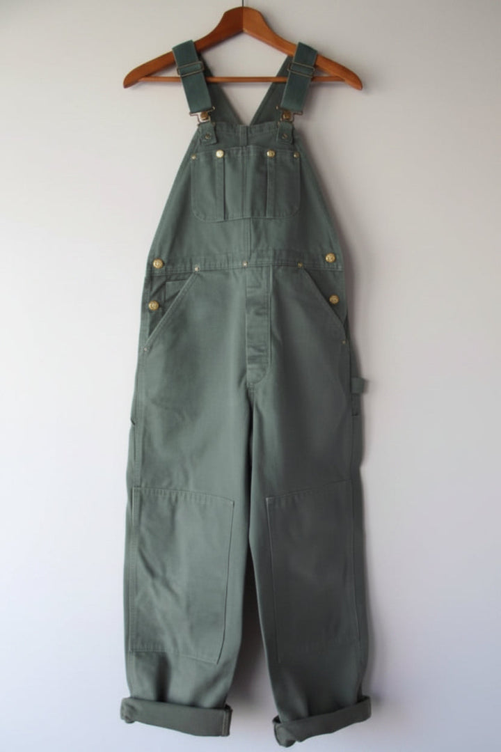 Durable unisex bib overalls, vintage-style with utility pockets & adjustable straps. Perfect workwear.