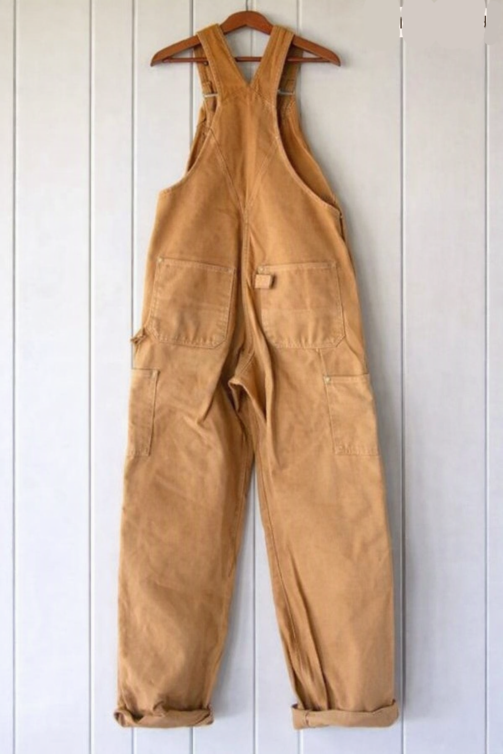 Fashionable unisex vintage overalls; comfortable, durable, and versatile for everyday wear. Adjustable straps.