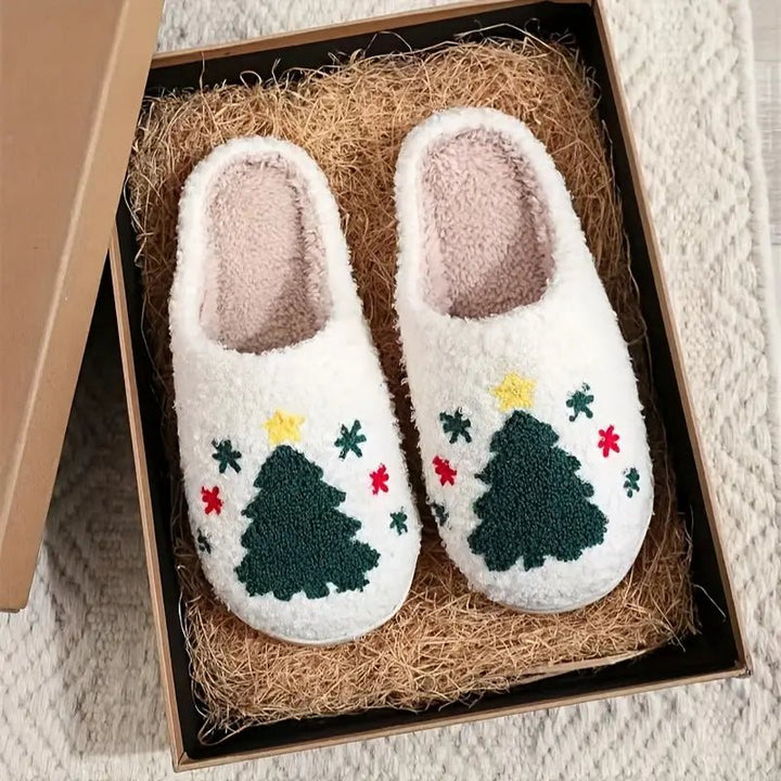Soft, warm unisex house slippers with a charming festive deer motif & non-slip sole for winter.