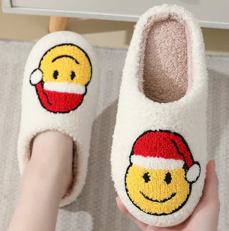 Unisex warm non-slip slippers with festive deer motif. Comfortable indoor winter footwear for all.