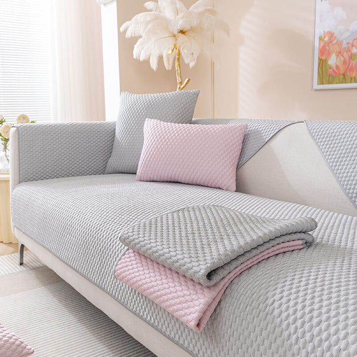Easy-to-install washable cooling sofa cover, demonstrating anti-scratch protection for a busy household