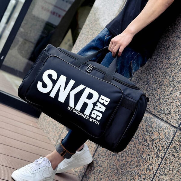 Unisex water-resistant travel bag for sneakers & gym gear. Organized duffel for travel & sports.