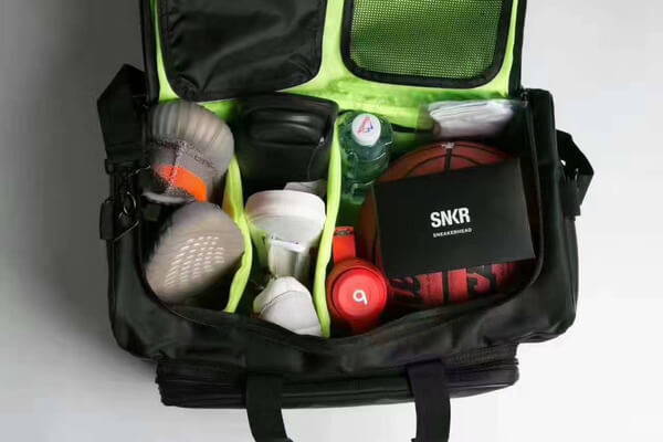 Spacious water-resistant travel bag, perfect for multiple sneakers, gym gear, and travel needs.