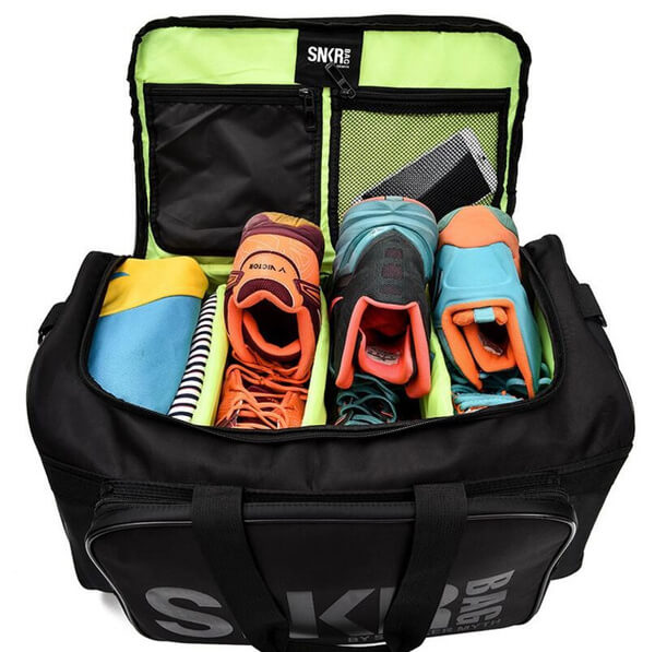 Sleek unisex travel bag for sneakers & athletic gear. Water-resistant and easy to carry.