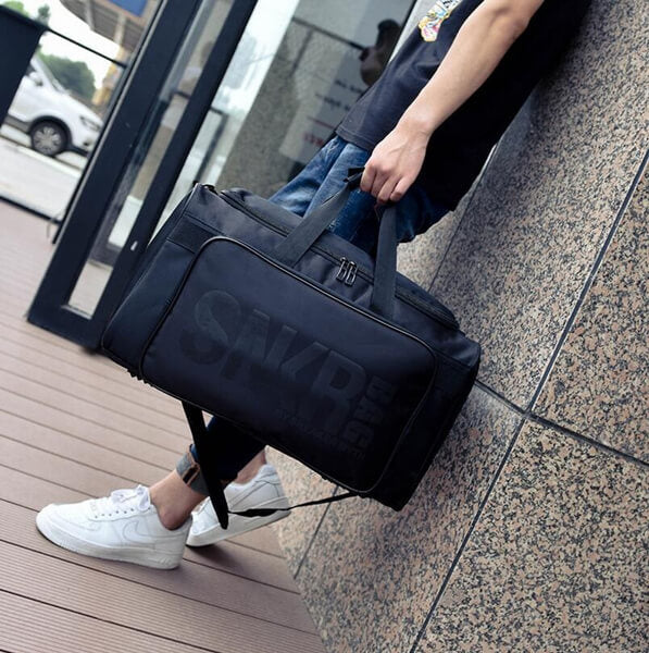 Unisex multi-purpose duffel bag. Water-resistant for travel, sneakers, & sports equipment storage.