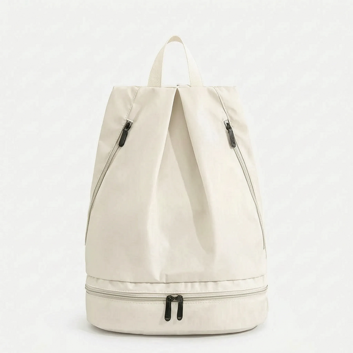 Compact waterproof travel backpack for daily use, swim gear, and light hiking; durable polyester material.