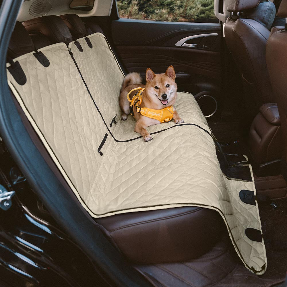Black pet protector for car back seats, offering universal fit and waterproof barrier for dog travel