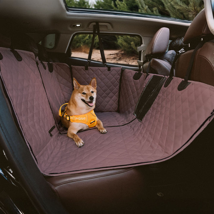 Universal fit pet travel car cover, designed to be waterproof and durable for safe and tidy trips with dogs