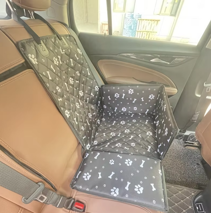 Protective dog car seat cover, waterproof and non-slip, ideal for clean and safe pet vehicle trips.