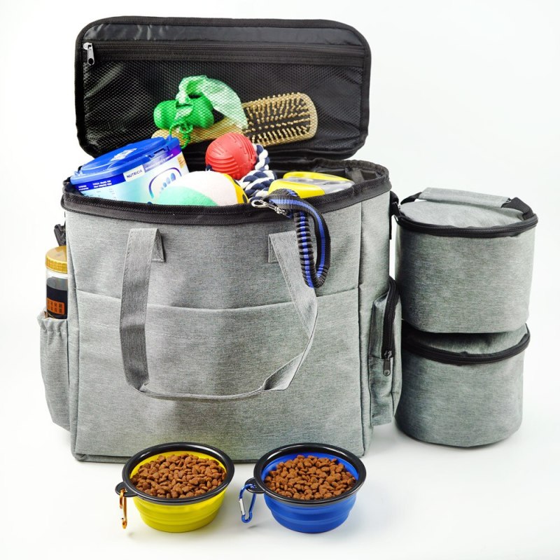 Dog travel food bag with shoulder strap, organized compartments for pet essentials, suitable for car journeys