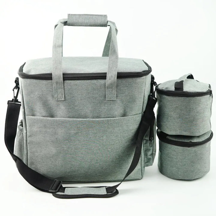 Close-up of a dog travel bag showing secure zippers and ample space for pet food & accessories in a car