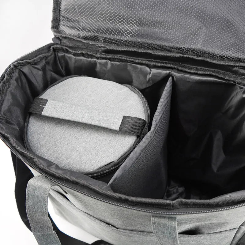 Detailed view of interior pockets of the dog travel bag, perfect for organizing pet accessories for car travel
