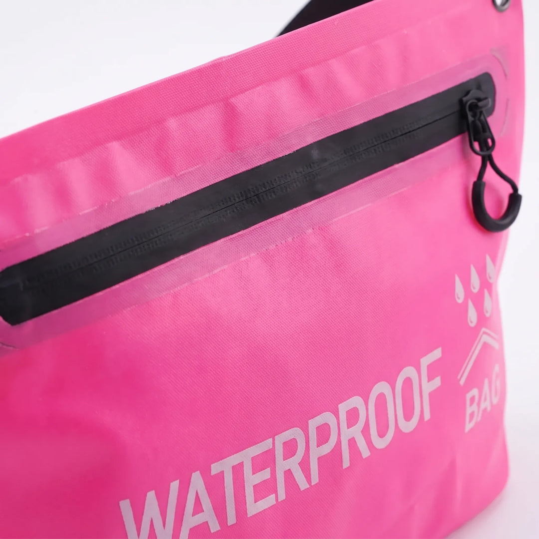 Compact waterproof dry bag, essential organizer for outdoor gear, swimming, & travel. Keeps items dry & secure.