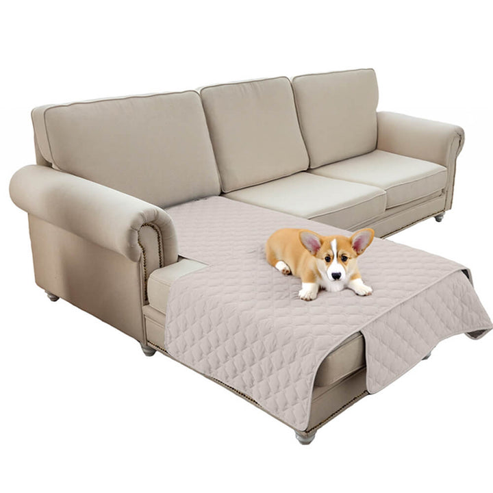 Folded washable waterproof non-slip diamond quilted pet couch cover, ready for easy storage or transport