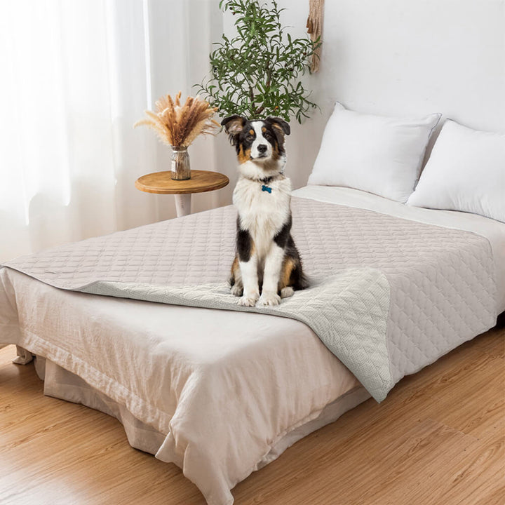 Corner detail of a non-slip waterproof pet couch cover, illustrating secure fit and elegant diamond quilting