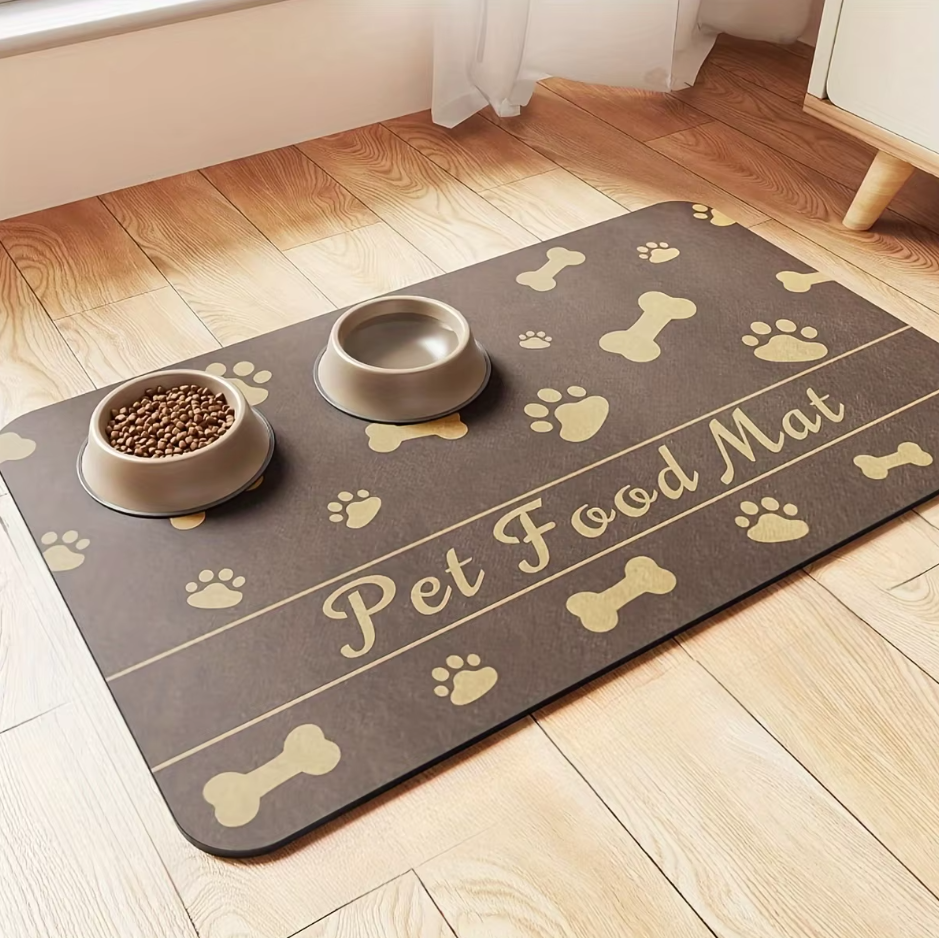 Grey waterproof dog bowl mat with raised edges prevents spills, non-slip for pet feeding.