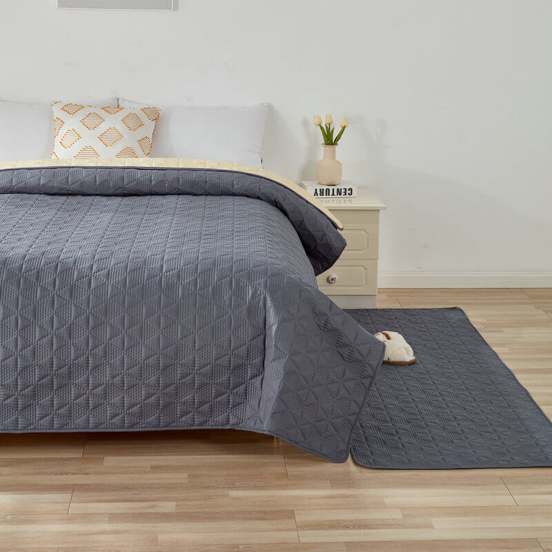 Unisex pet protector mat draped over a chair, showing effective furniture coverage, stylish couch cover