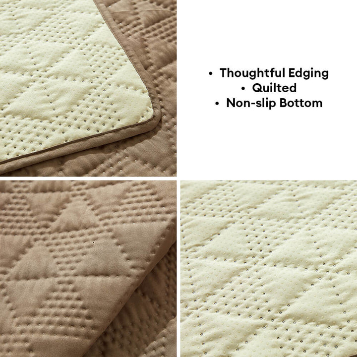 Detail of stitched edge on waterproof non-slip pet protector mat, emphasizing quality, pet bed cover