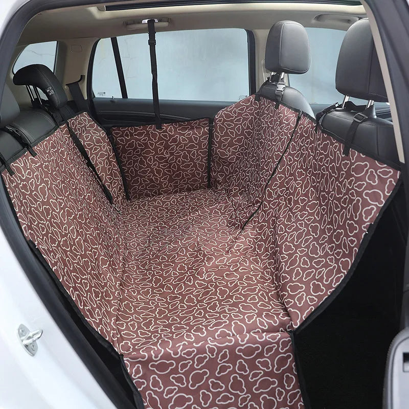Foldable pet car boot liner mat next to pet supplies, waterproof and ready for dog travel