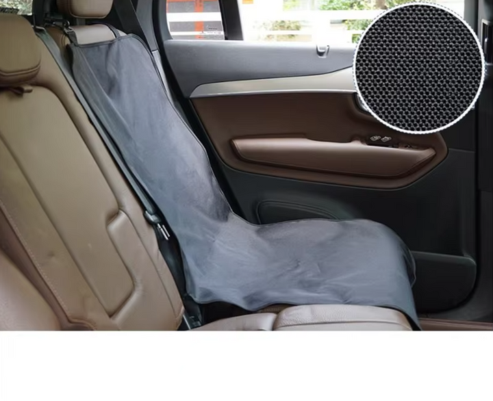 Happy dog resting on a waterproof, non-slip pet car back seat cover