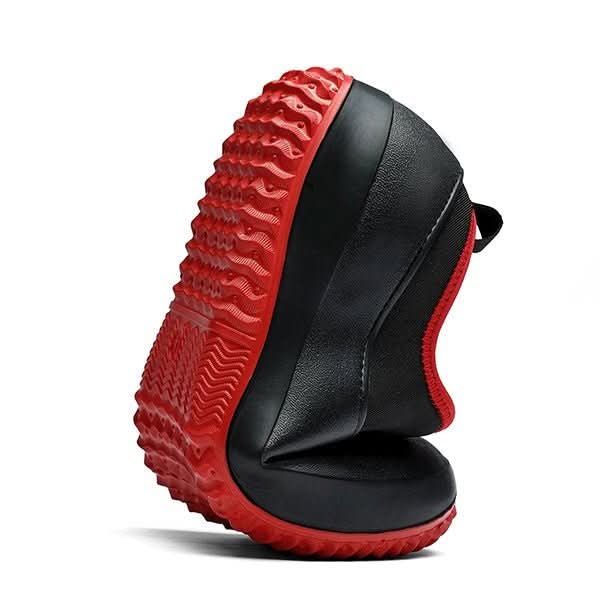 Pair of black unisex waterproof work shoes, slip-resistant design ensures comfort and safety for various jobs.