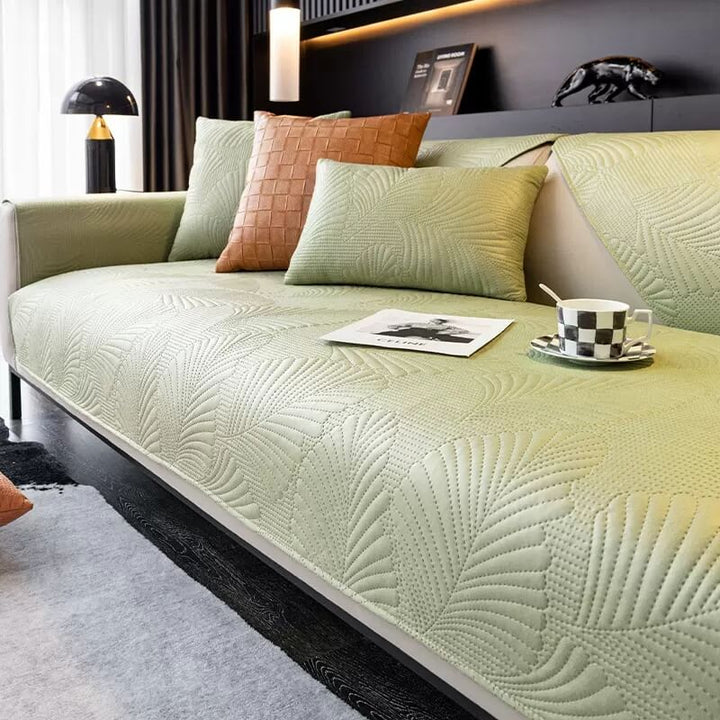 Waterproof couch cover designed for easy installation and removal, pet and child friendly