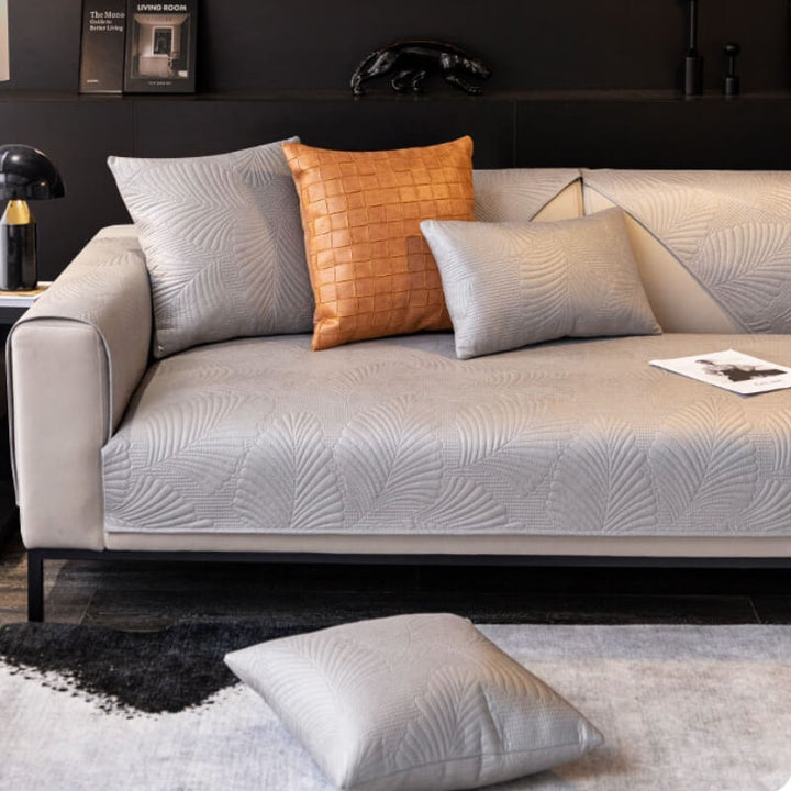 Waterproof sofa protector installed on a sectional couch, non-slip design, home decor