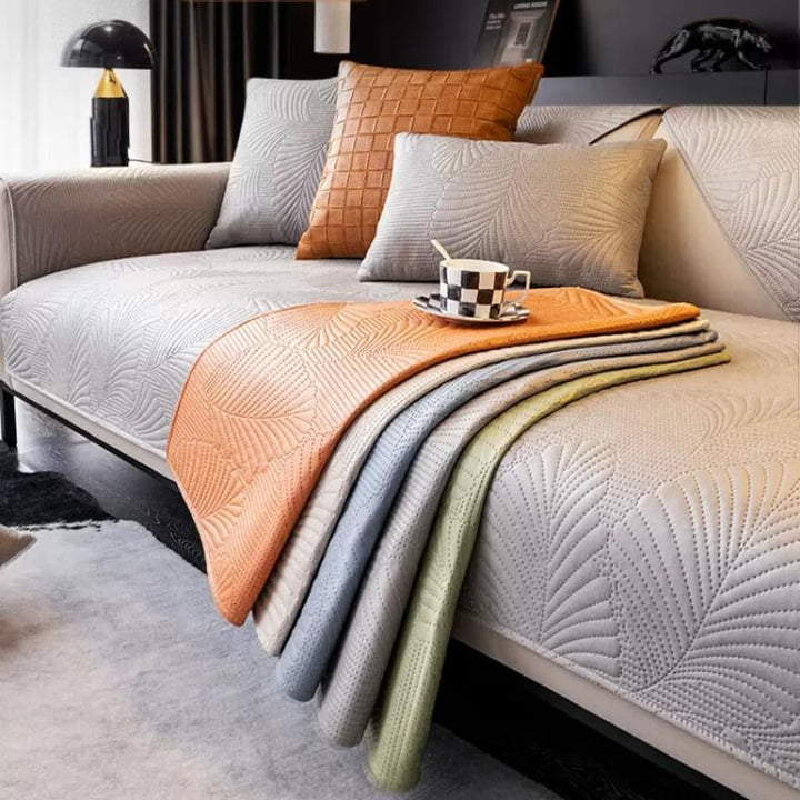 Pet-friendly couch cover protecting a sofa from scratches and spills, machine washable