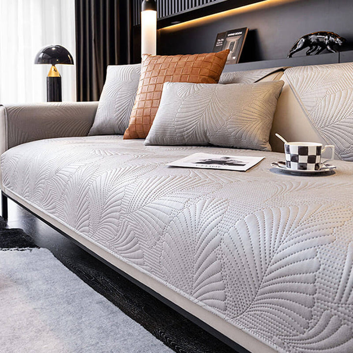Overhead view of a waterproof sofa cover completely protecting a sectional, pet friendly