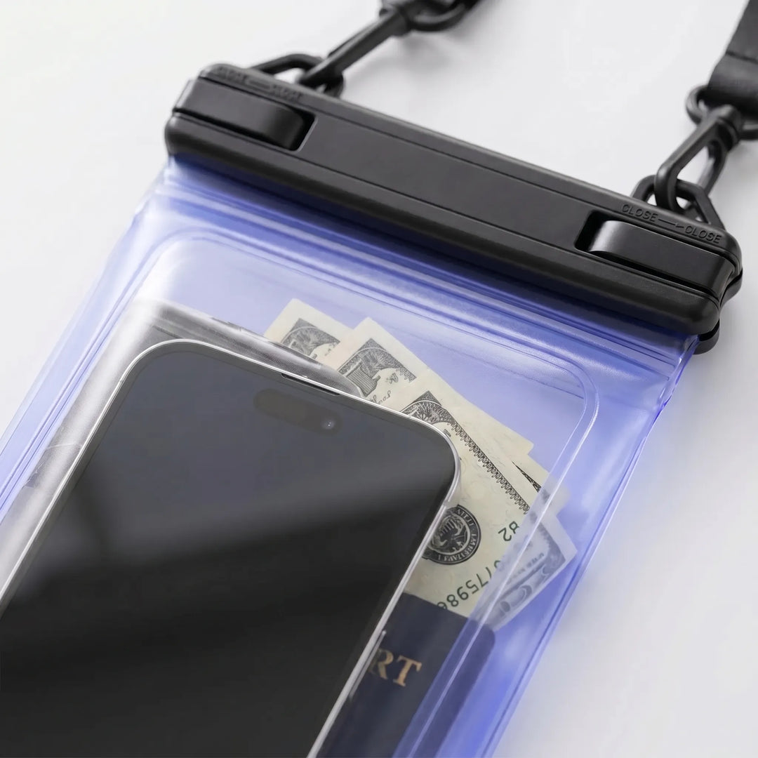 Crossbody waterproof phone pouch. Touchscreen compatible. Essential for beach trips & adventure.