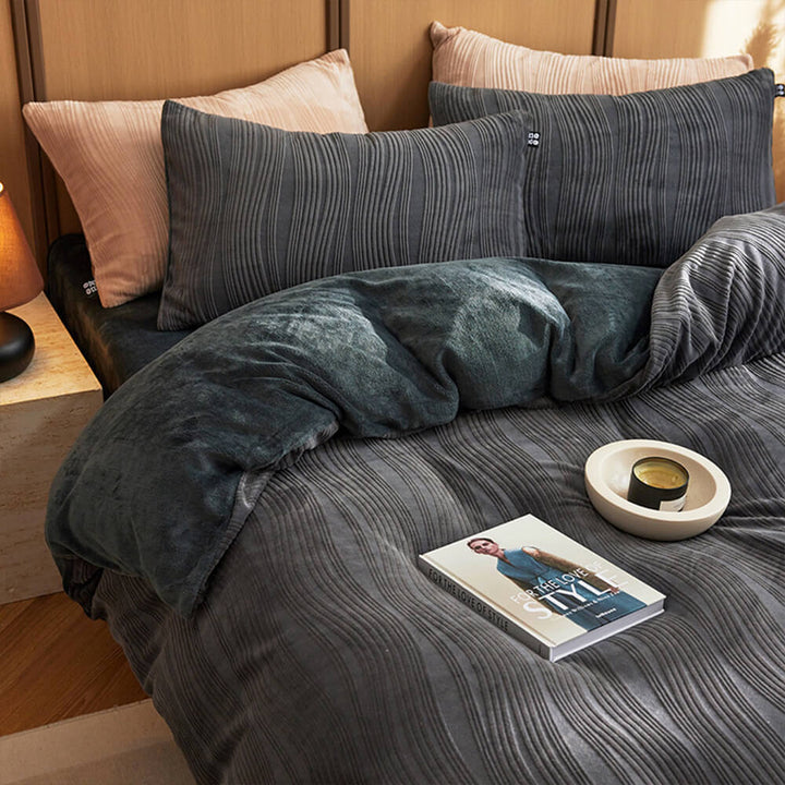 Elegant wavy line milk velvet bed sheets, offering a touch of luxury to your room.