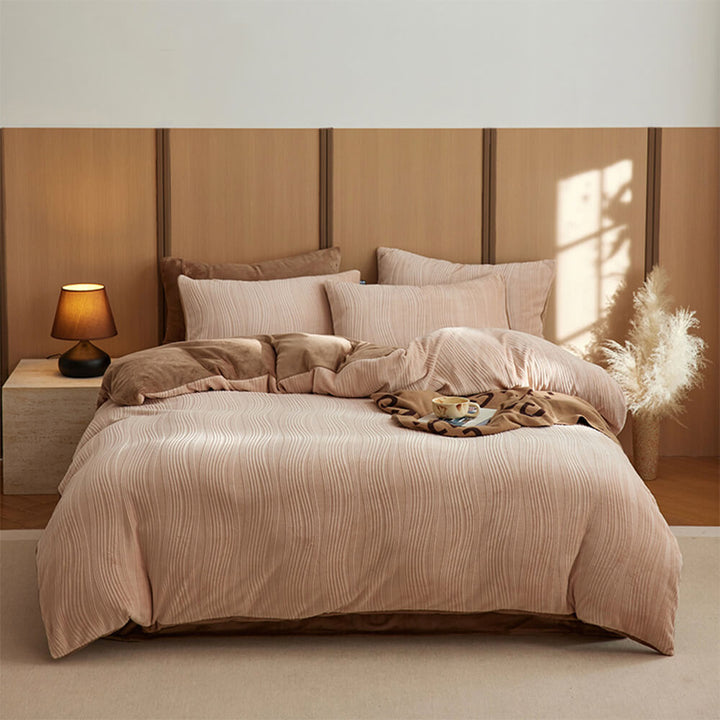 Warm bedding set featuring a unique wavy line design on plush milk velvet fabric.