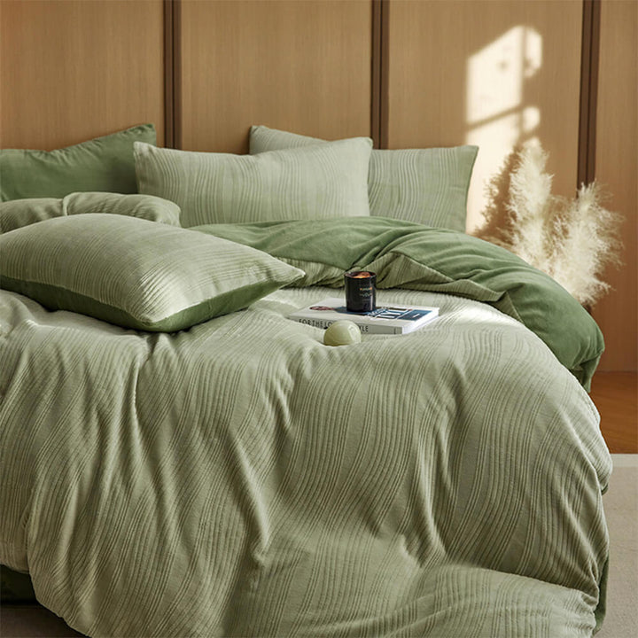 Cozy bedding set made from milk velvet with a distinctive wavy line pattern.