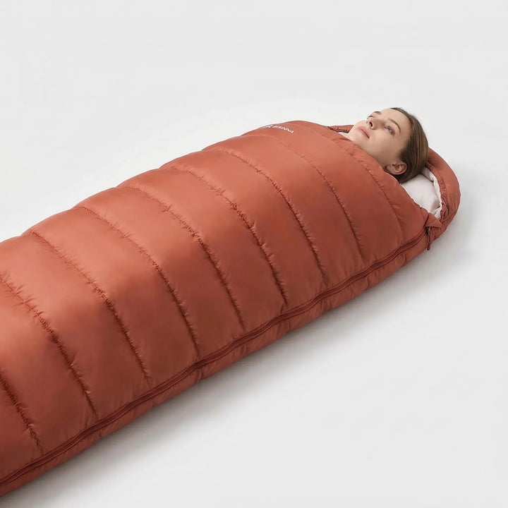 Compact & wide 3-season unisex sleeping bag, perfect for easy backpacking, camping, and travel.