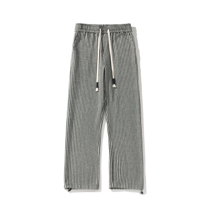 Stylish unisex wide-leg sweatpants with a distinctive herringbone pattern, perfect for comfortable, casual everyday fashion.