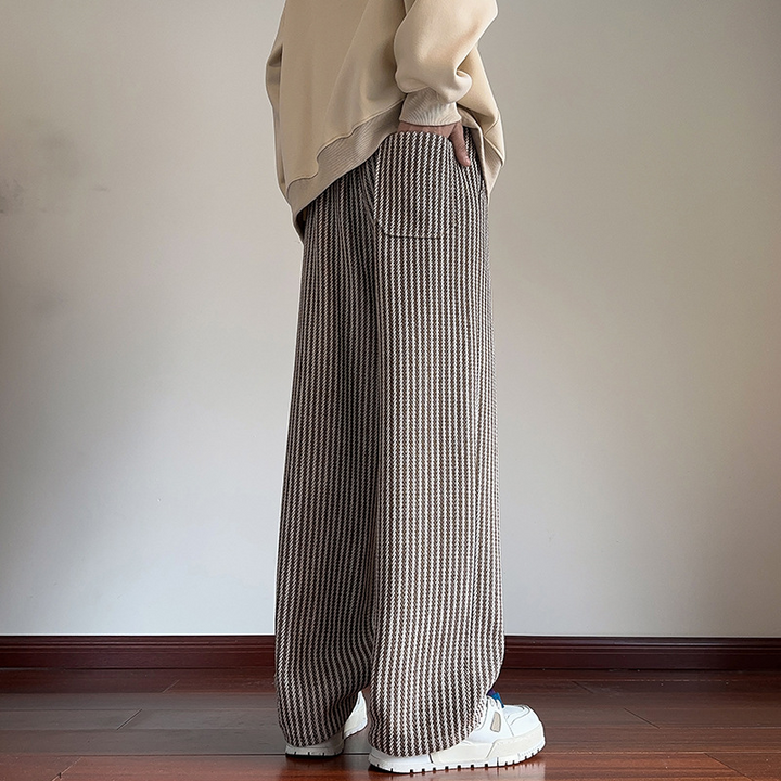 Hype unisex wide-leg sweatpants with a chic herringbone texture & drawstring, offering a relaxed fit for casual style.