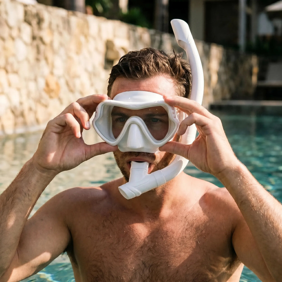 Unisex wide view snorkeling mask with clear lens for incredible underwater adventures.
