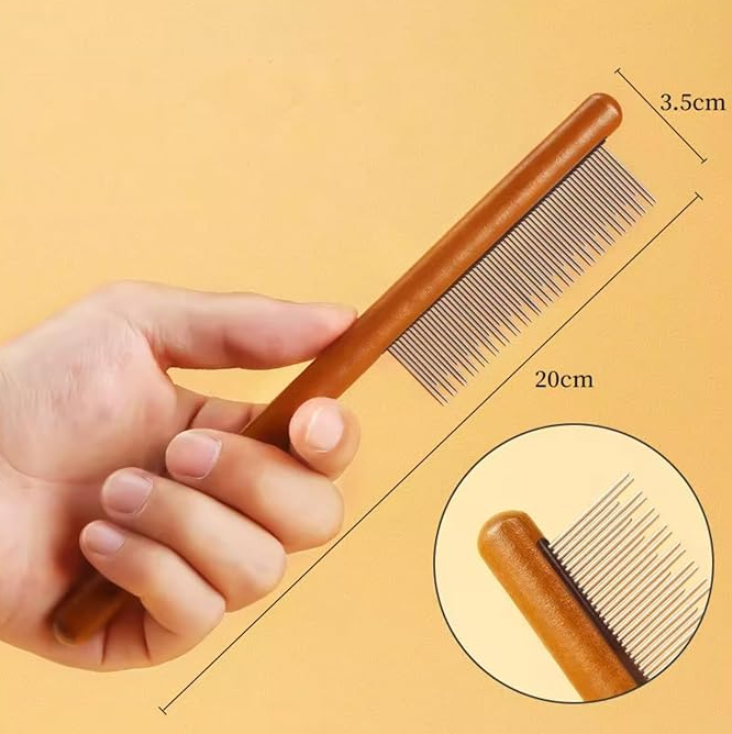 Detailed view of the fine teeth on a wooden pet flea comb, perfect for dog and cat grooming, flea removal