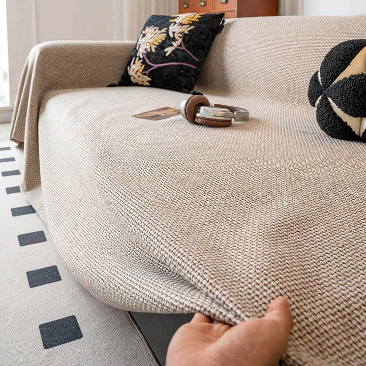 Modern linen-look couch cover, breathable and pet-friendly, a practical and stylish furniture accessory.