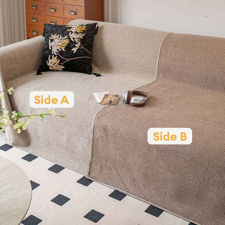 Beige linen-look couch cover for pets, scratch-resistant and breathable, a minimalist furniture protector.