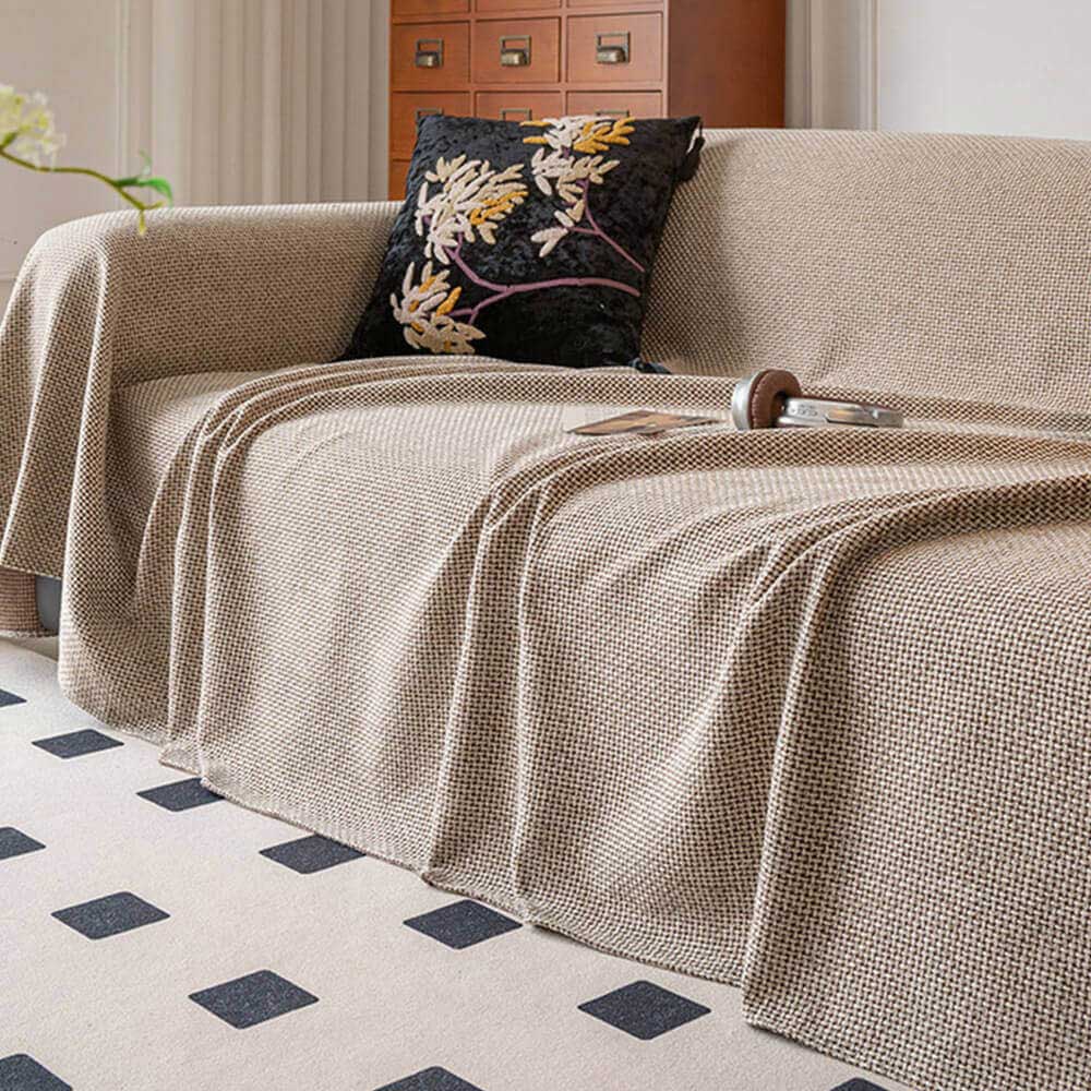 Minimalist linen-look furniture protector, pet-friendly and easy to clean, enhancing living room decor.