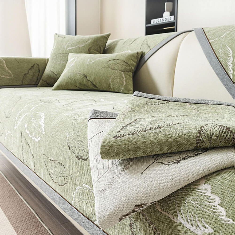 Universal chenille sofa slipcover with intricate leaf texture, non-slip, perfect for pet-friendly homes.