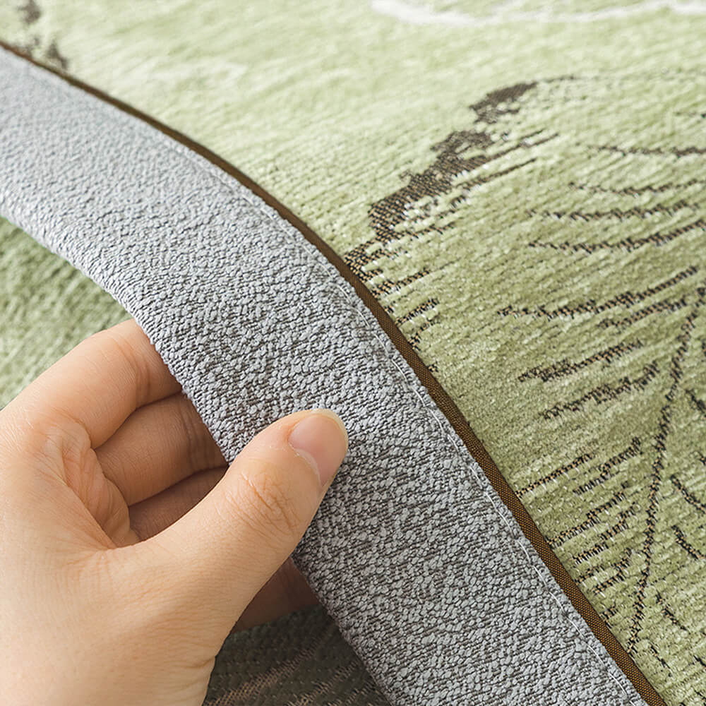 Easy-clean chenille sofa cover with subtle leaf texture, acting as a stylish furniture protector.
