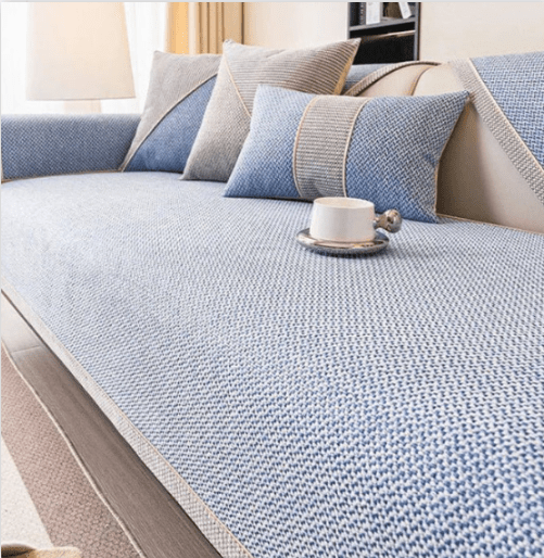 Durable cotton-linen sofa protector, non-slip couch cover, ideal for busy family living rooms.