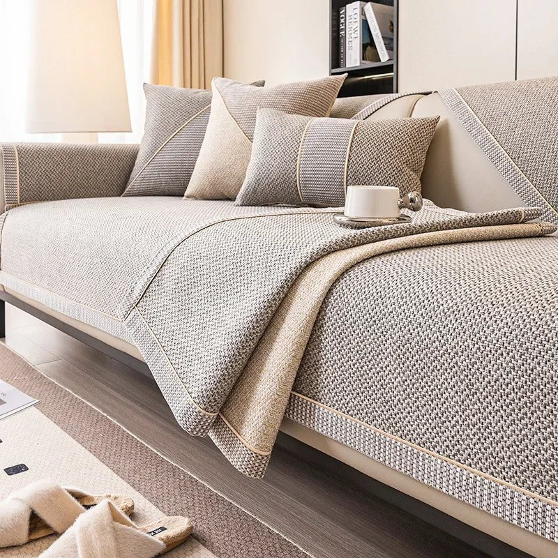 Pet-friendly cotton-linen couch protector, non-slip design, shields furniture from pets & spills.