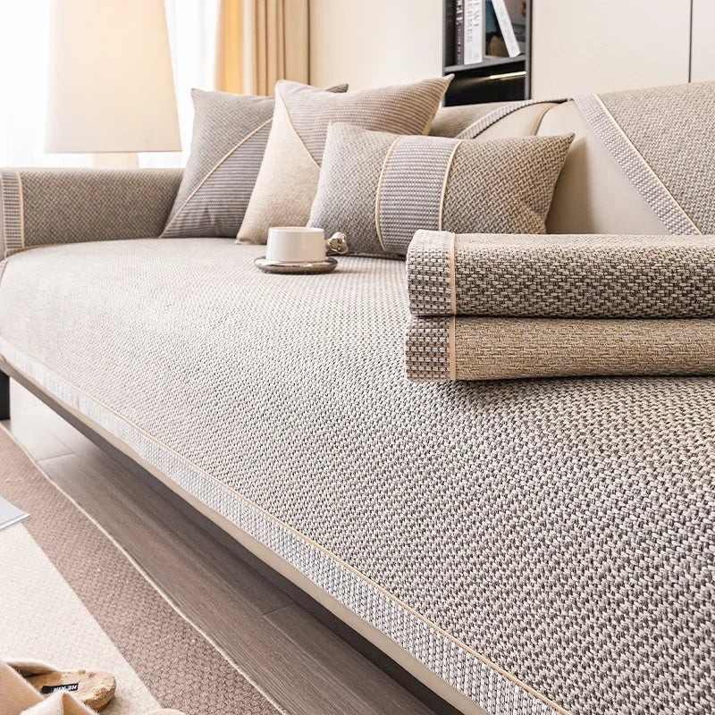 Stylish cotton-linen sofa cover, universal non-slip design, enhances living room decor all seasons.