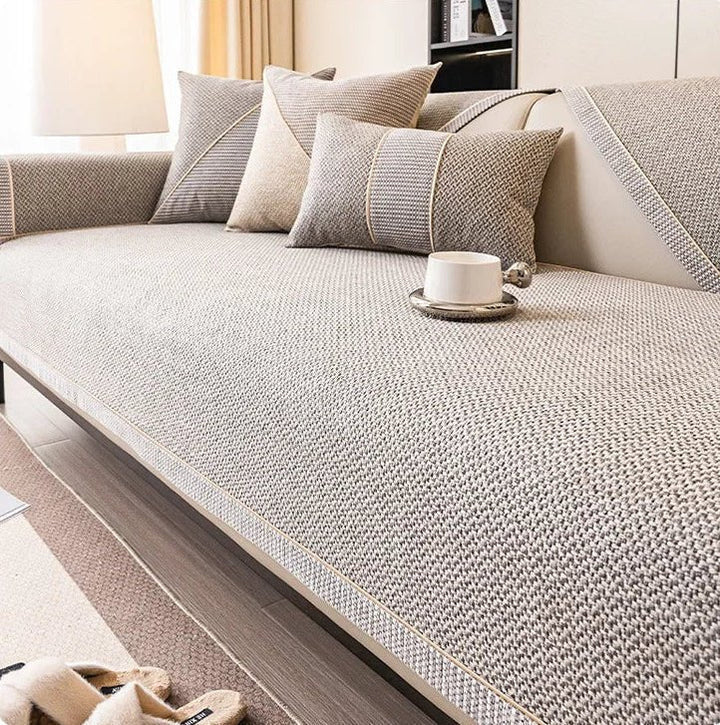 All-season non-slip sofa protector, durable cotton-linen couch shield for active living rooms.