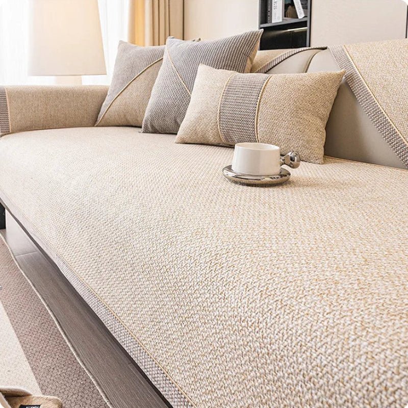 Universal non-slip cotton-linen sofa protector for couches and sectionals, all-season use.