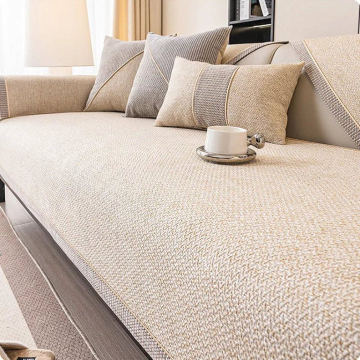 Universal non-slip cotton-linen sofa protector for couches and sectionals, all-season use.