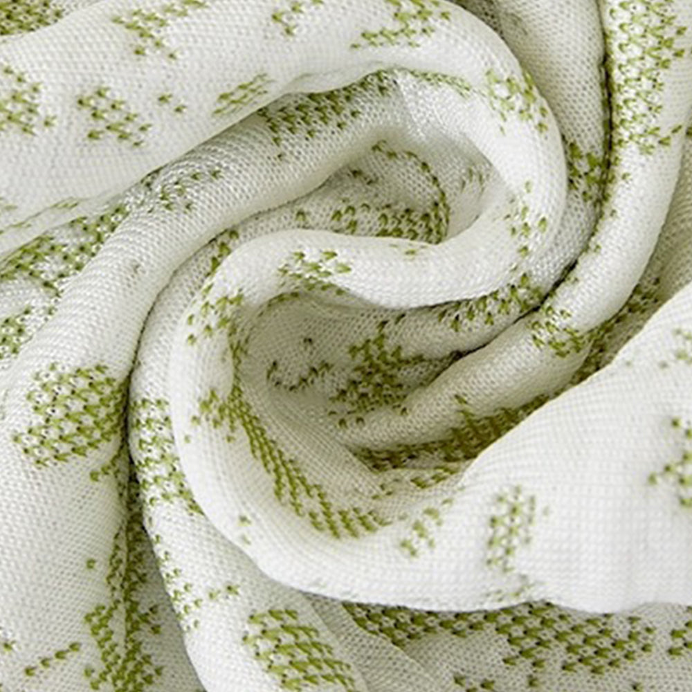 Detail shot of the elastic band on an ice silk sofa protector, ensuring a snug fit for furniture protection